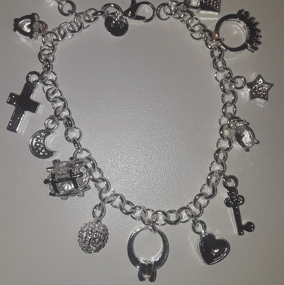 925 Silver and stamped 13 charms bracelet